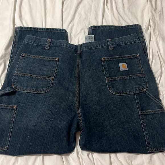 Carhartt carpenter jeans in blue denim. Size 42x30. Durable work jeans. - Picture 4 of 6
